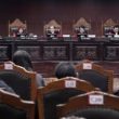 Mahkamah Konstitusi menolak seluruh permohonan dan memutuskan sistem pemilu Terbuka
